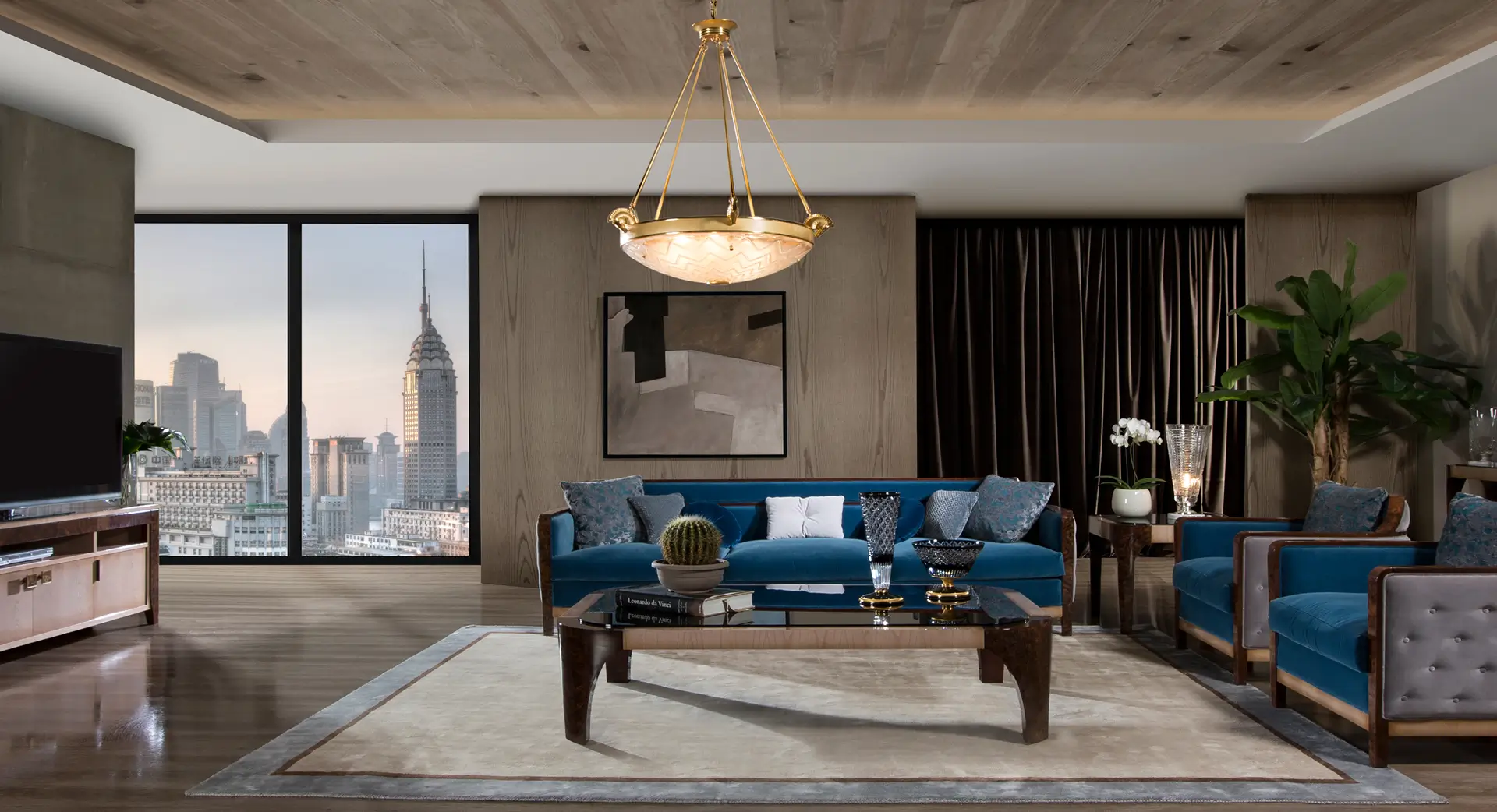 High-end furnished interior space with lounge seating and skyline view